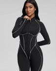 Tuta intera nera modellante con cuciture sagomate e zip frontale Fijame